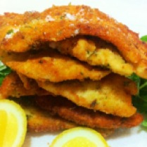 https://thepaddingtonfoodie.com/2012/11/20/crisp-and-crunchy-parmesan-parsley-and-lemon-crumbed-chicken-schnitzel/