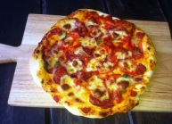 https://thepaddingtonfoodie.com/2012/11/10/russells-little-secret-stone-pizza-with-ham-sopressa-capsicum-confit-garlic-basil-and-mozzarella/