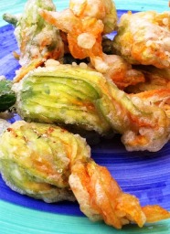 https://thepaddingtonfoodie.com/2012/12/17/fresh-from-my-fathers-summer-garden-battered-zucchini-blossoms-with-ricotta-herbs-and-lemon/